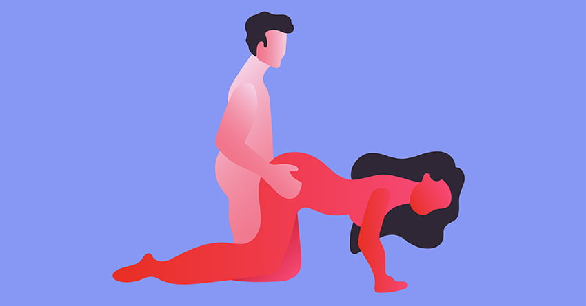 A couple having sex in a doggy style position. 