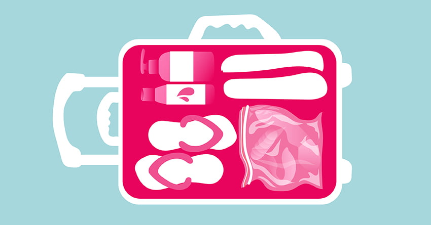 A luggage filled with personal care items and sex toys. 