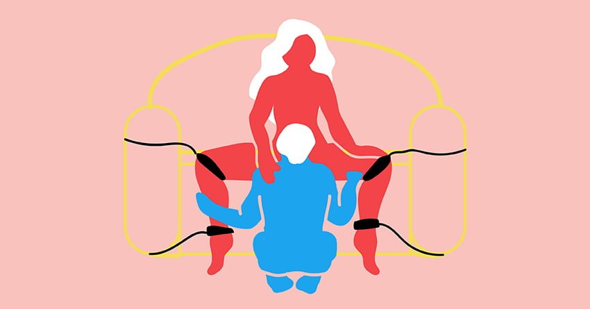 A couple engaging in Chair Bondage sex position. 