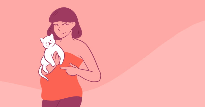 A pregnant woman holding a cat. 