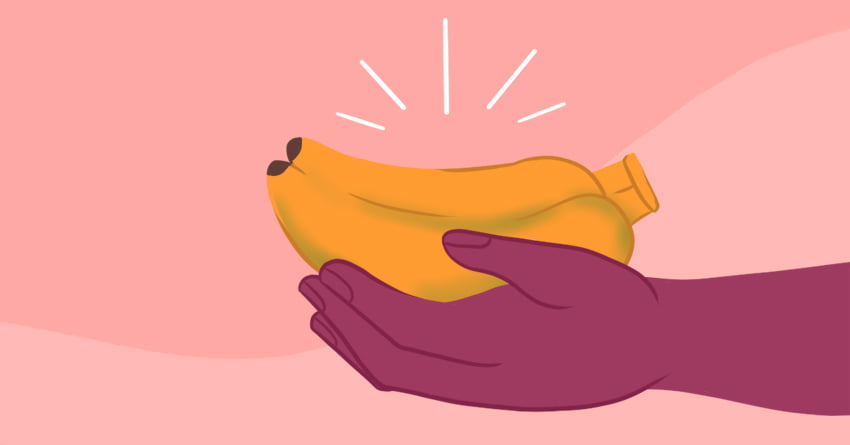 A hand holding a twin banana. 