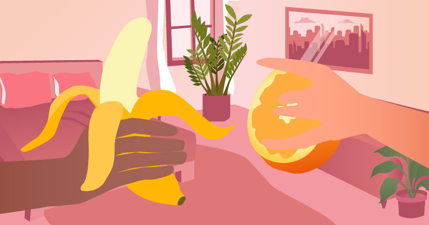 A hand holding a banana and another hand holding orange. 