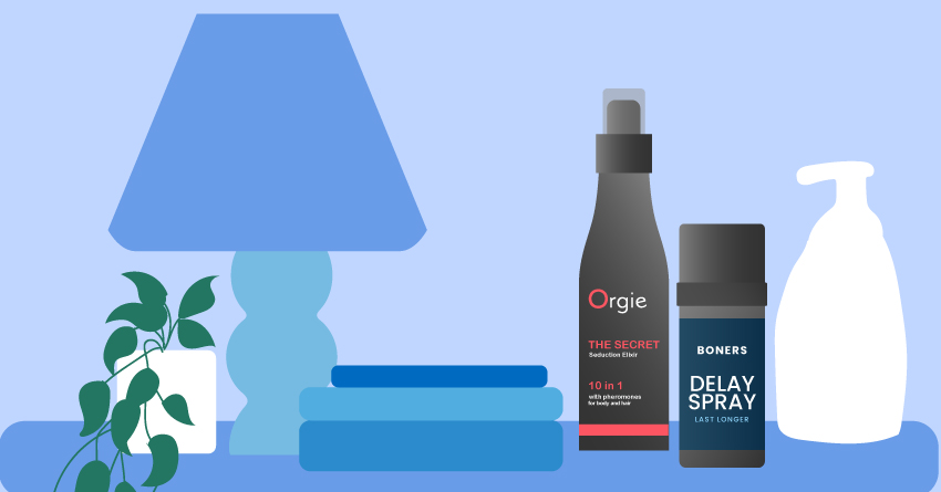 A table filled with bottles of delay sprays and creams.