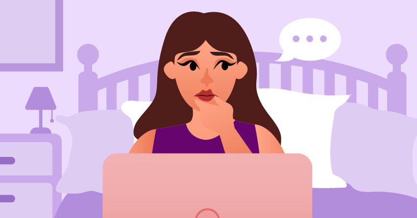 A woman thinking about something while checking her laptop. 