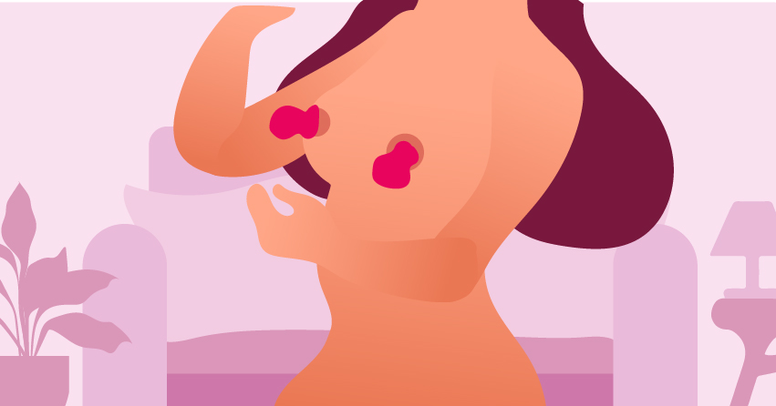 A woman wearing nipple suckers. 