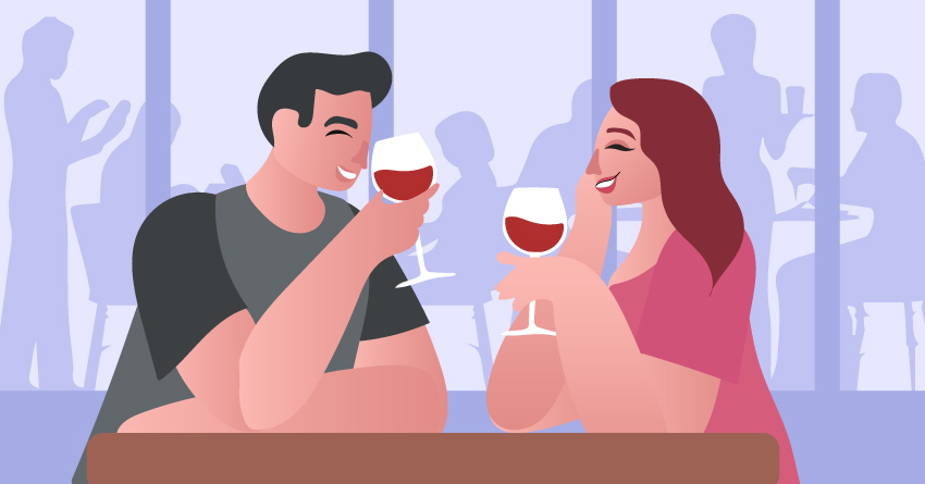 A couple flirting while drinking wine. 