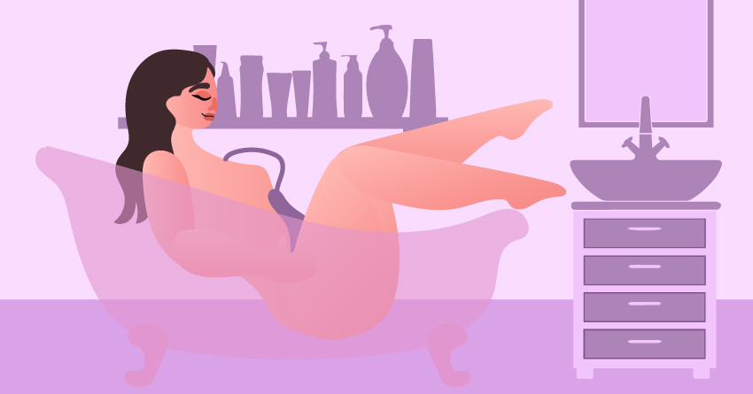 A woman masturbating in her bathtub. 