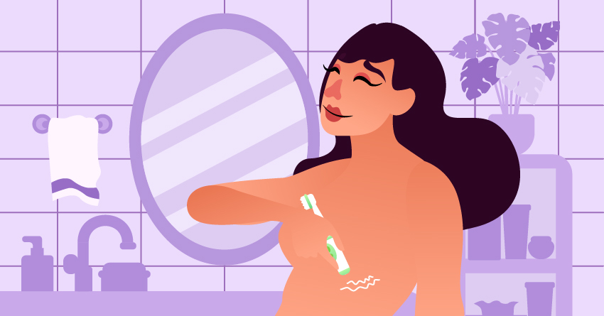 A naked woman pressing the electric toothbrush's base to her nipples. 