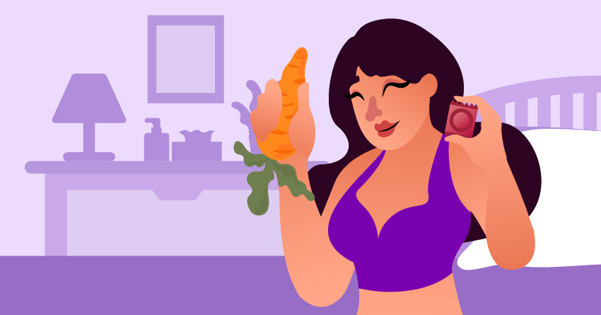 A woman holding a condom and carrot. 