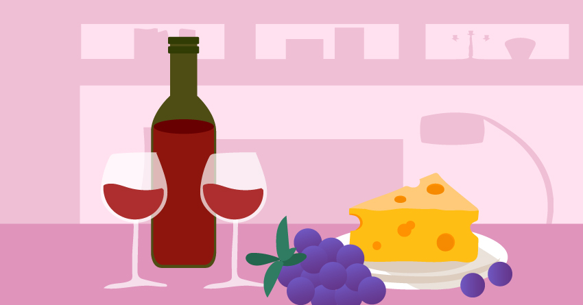 A table filled with cheese and wine. 