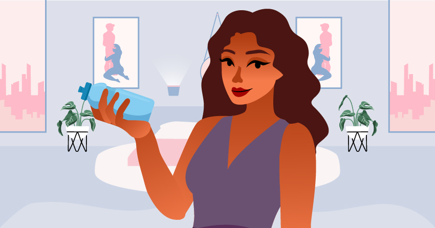A woman holding a water tumbler. 