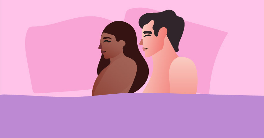 A naked couple sleeping after having sex. 