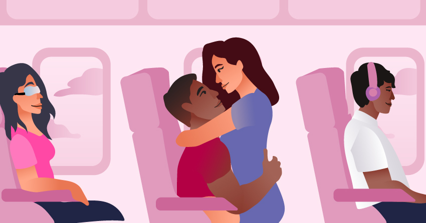A couple cuddling inside an airplane while everybody is busy. 