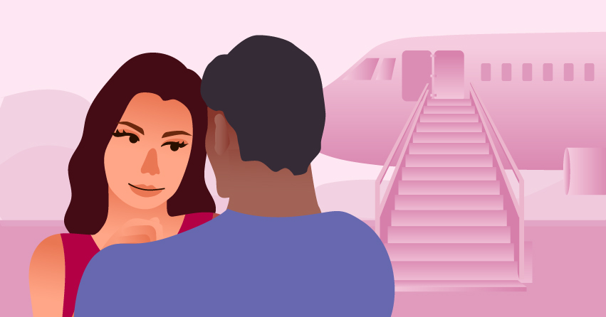 A couple teasing each other as they enter the airplane. 