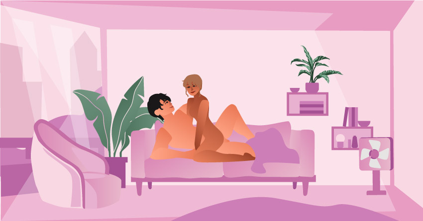A couple having sex in the couch. 