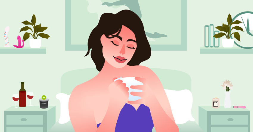 A woman drinking a cup of coffee. 