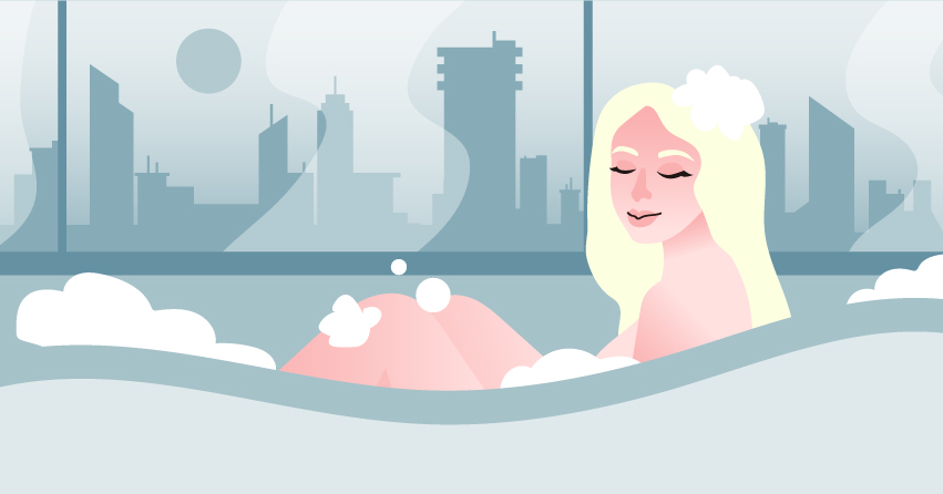 A woman having a bubble bath. 