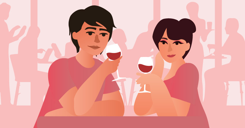 A couple drinking wine during their date night. 