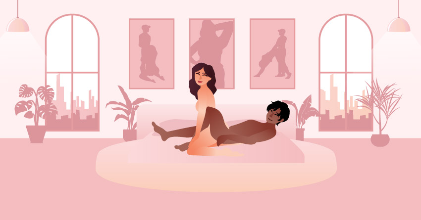 A couple having sex in a cowgirl position. 
